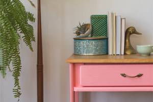 Close up of painted pink desk drawer
