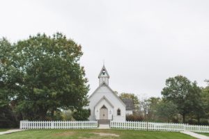 distant symmetrical photo of Living History Farms' Church of the Land