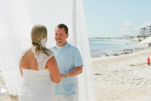 groom staring at bride during their cancun, mexico beach wedding
